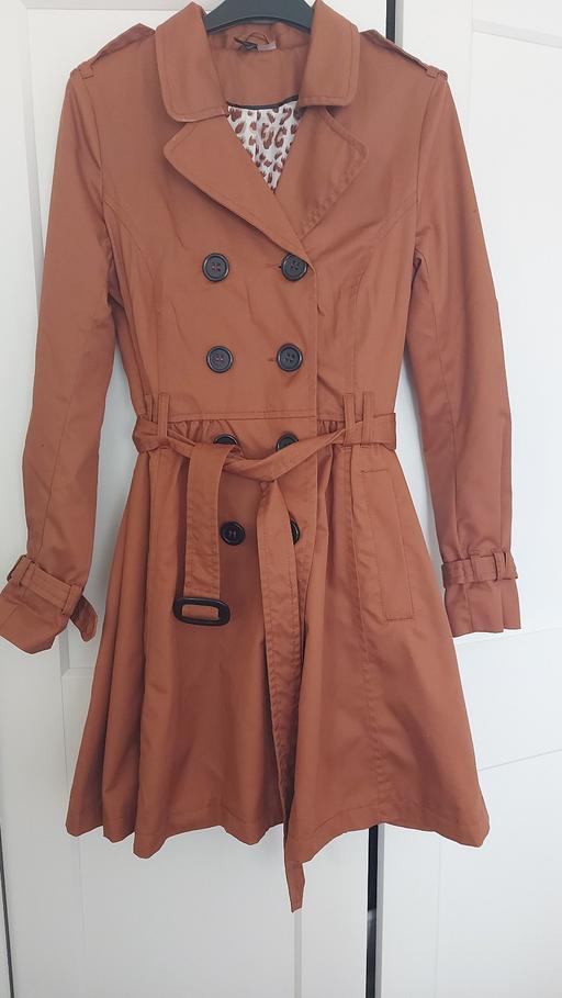 — trenchcoat