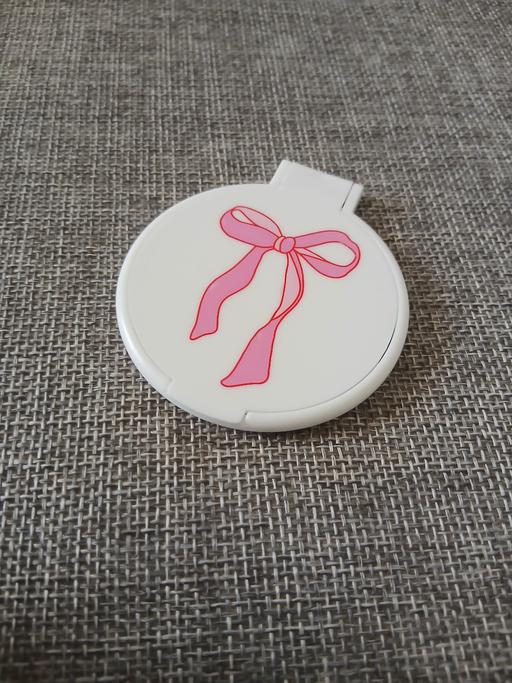  — Pocket Mirror New