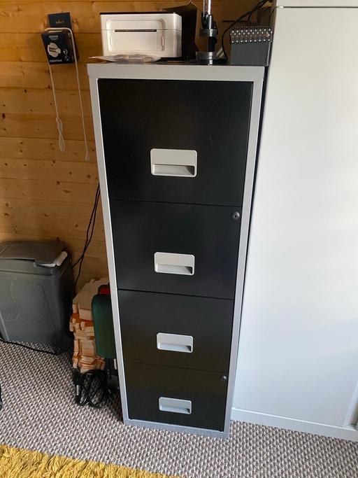  — Filing Cabinet