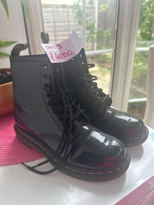  — Dr martens