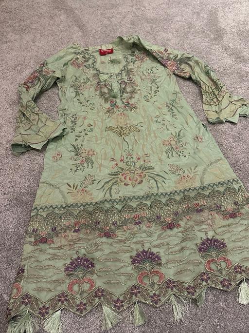  — Ladies Asian Suit