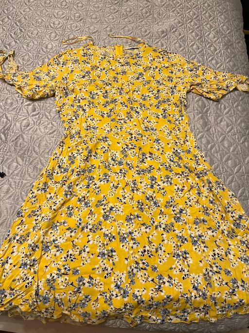  — Two floral summer dresses