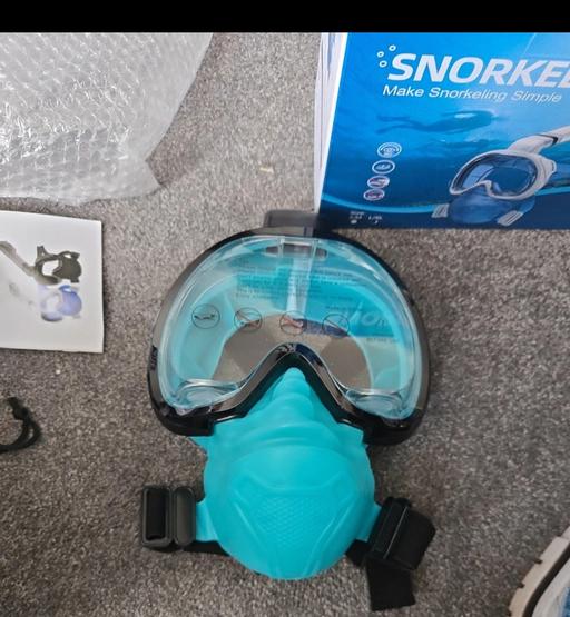  — folding snorkel mask