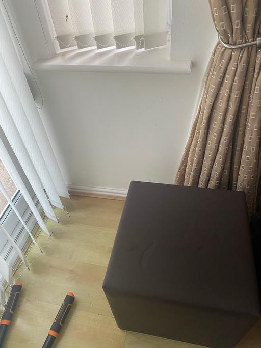  — Brown leather footstool