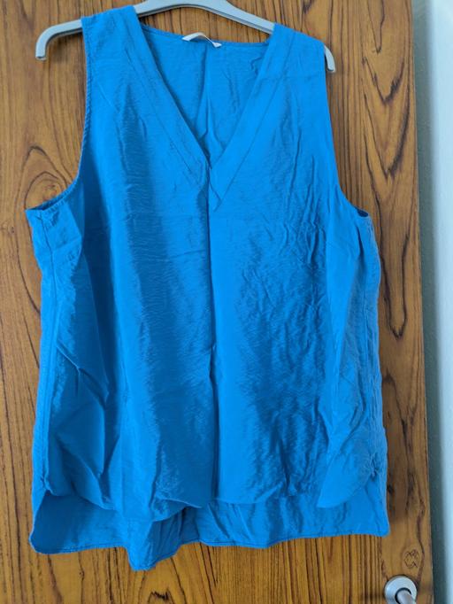  — size 24 ladys blue top