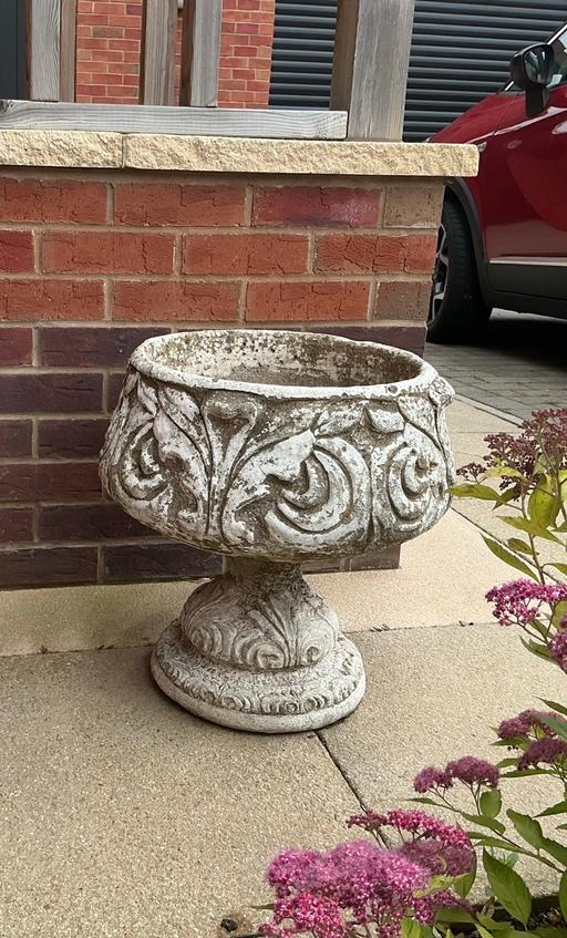  — 2 matching large concrete ornate planters