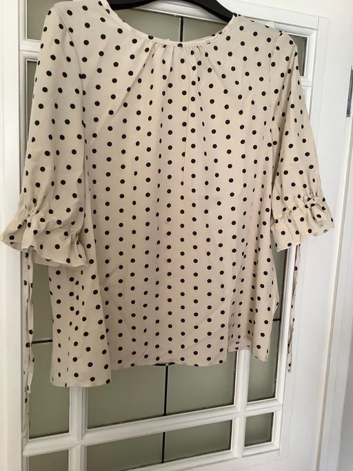  — New back buttons top