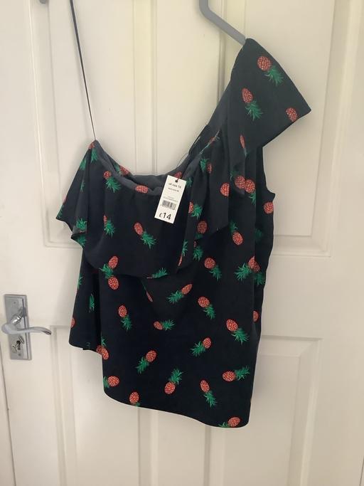  — New top