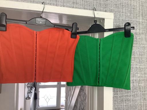  — Corset tops