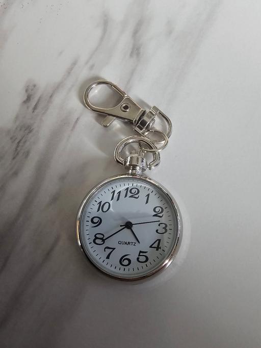  — quartz clip watch brand new