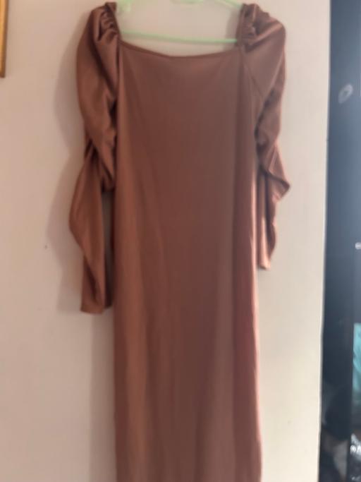  — Dress