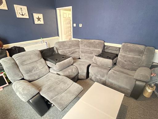  — Grey L shaped recliner sofa