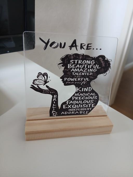  — Plaque New