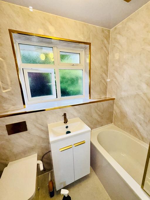  — Bathroom Fitter