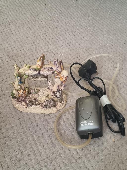  — Aquarium air pump with decoration