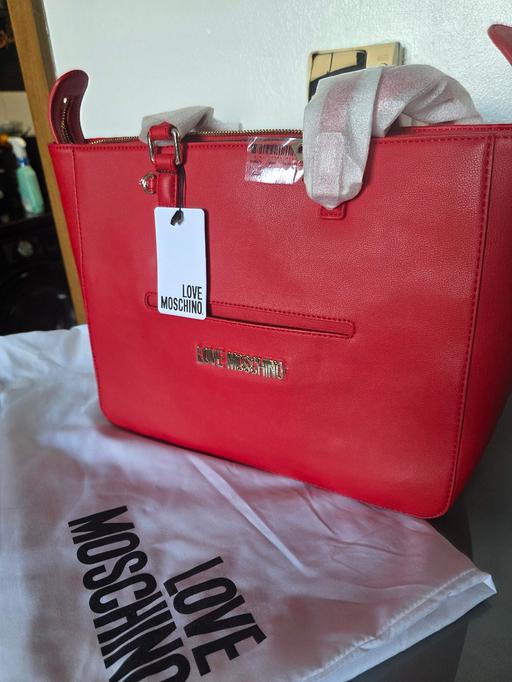  — Red moschino bag with purse