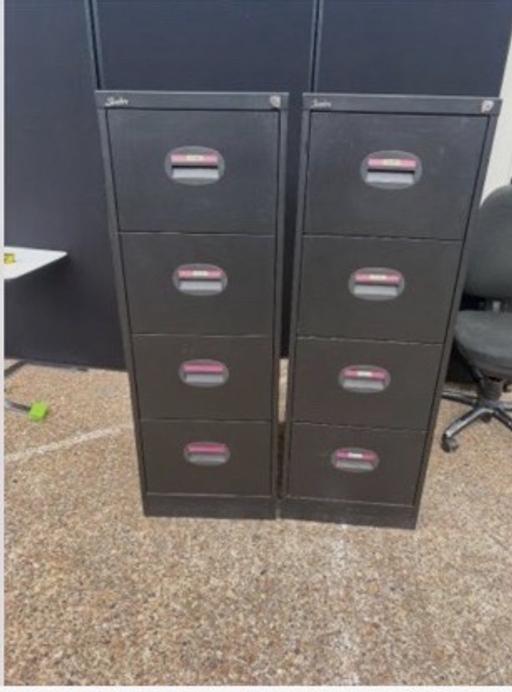  — 2 Used black 4 drawer filing cabinets