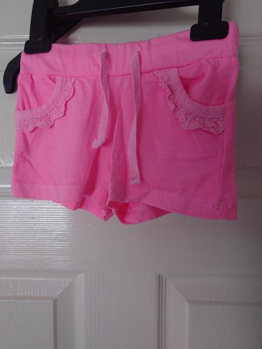  — Girls pink shorts size 12-18 months