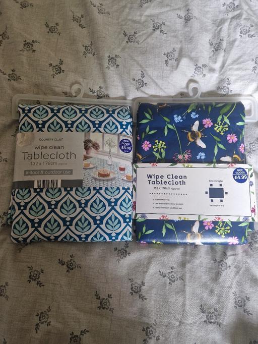  — brand new wipe down table cloths x2