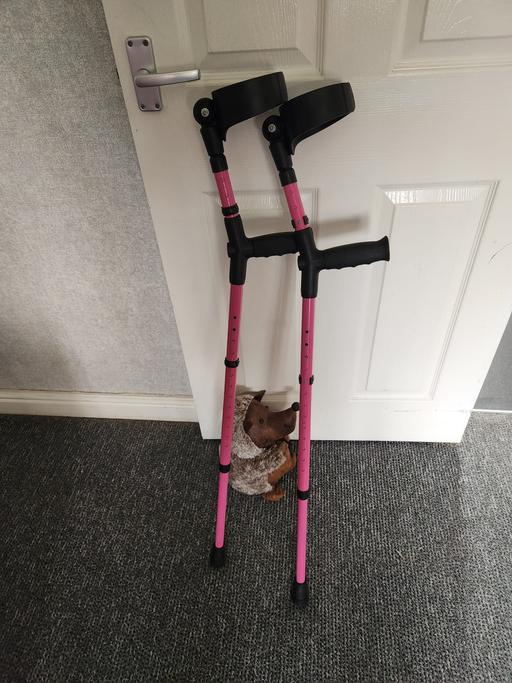  — Pink Elbow Crutches