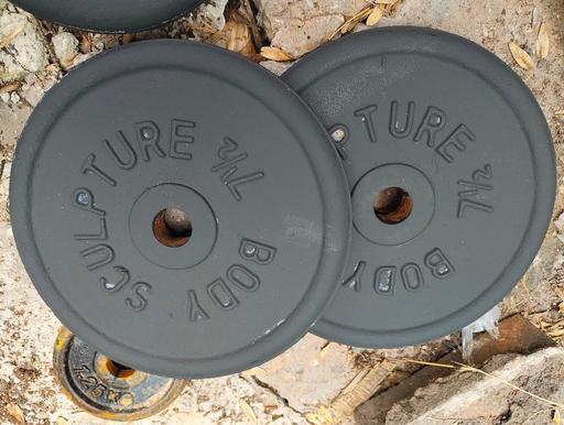  — gym equipment castiron weights 2 x 7.5kg