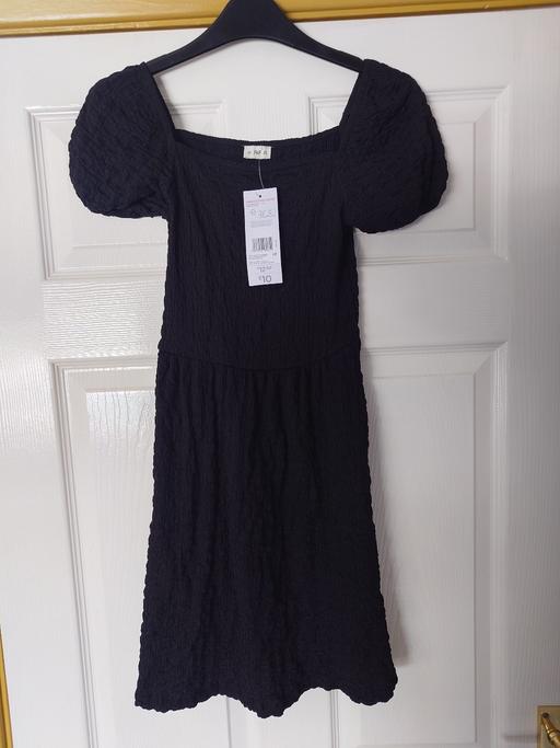  — Girls black crinkle dress size 10-11 years