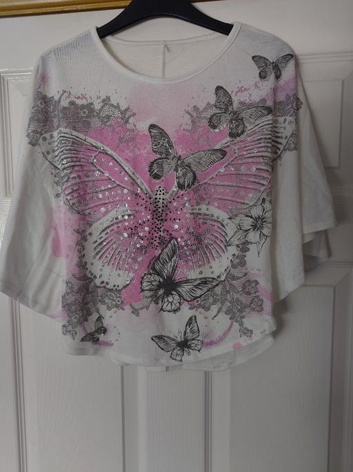  — Girls butterfly poncho top size 12-13 years
