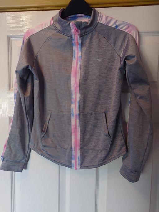  — Girls grey/pink tracksuit jacket size 11/12Y