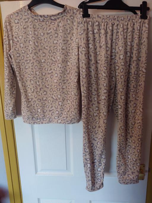  — Girls leopard print pyjamas size 12-13 years