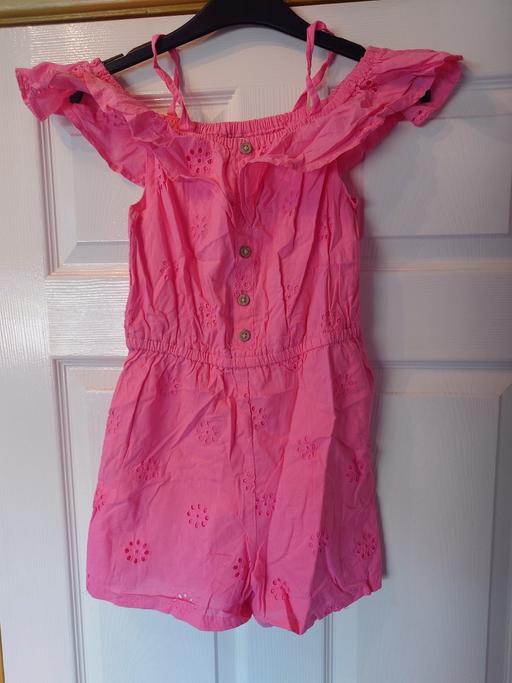  — Girls pink playsuit size 11-12 years