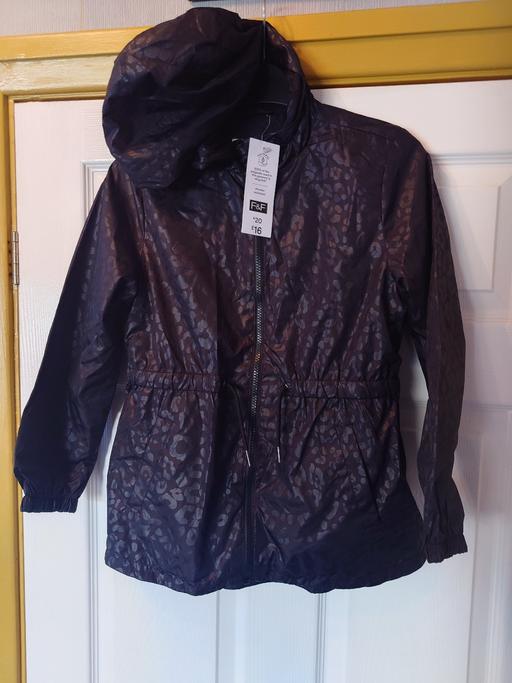  — Girls black coat size 9-10 years