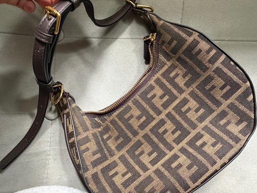  — Brown handbag