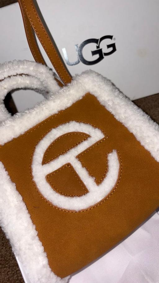  — Brown fur bag