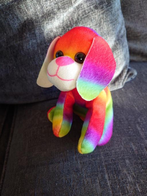  — Multicoloured dog soft toy