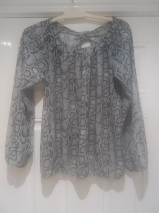  — LADIES LONG SLEEVED TOP