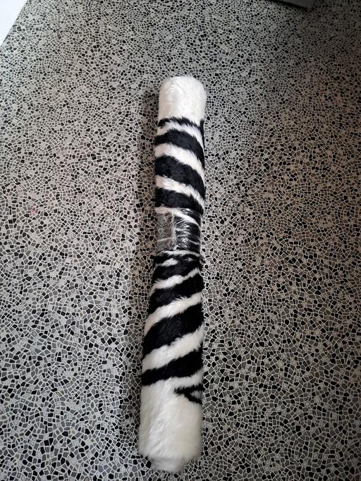  — new zebra fur rug