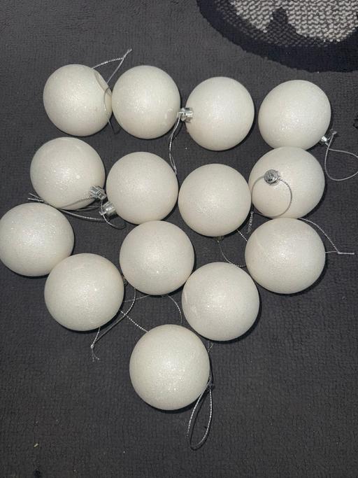  — White Baubles