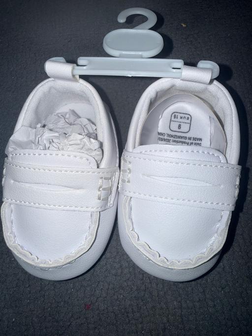  — Baby white shoes