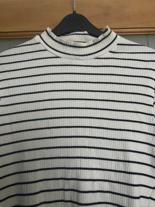  — TK Maxx top