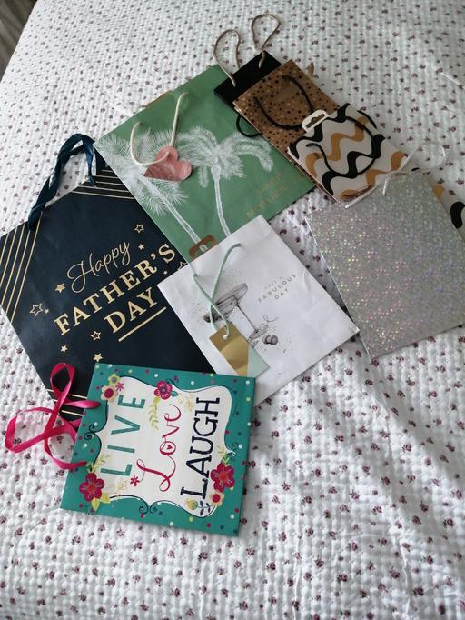  — Bundle of gift bags (one bit paper ripped)