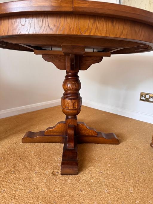  — Round Extendable Dining Table