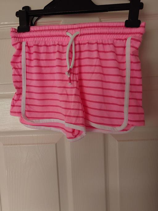  — Girls pink shorts size 11/12 years