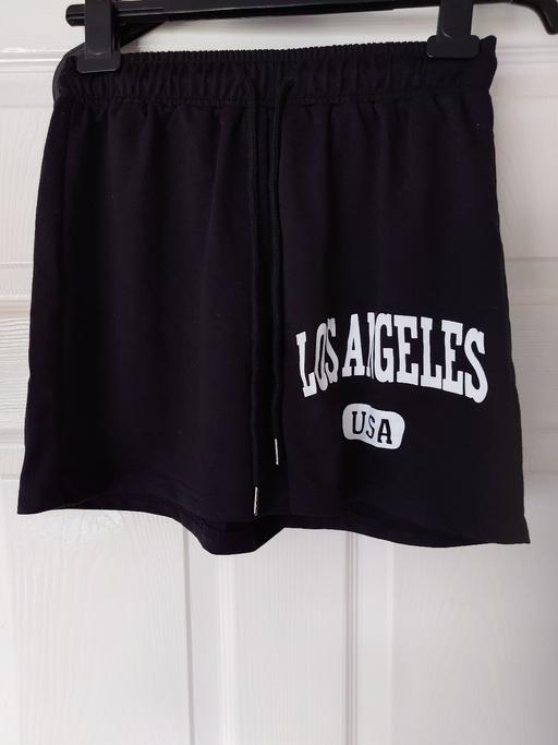  — Women's black shein shorts size XS