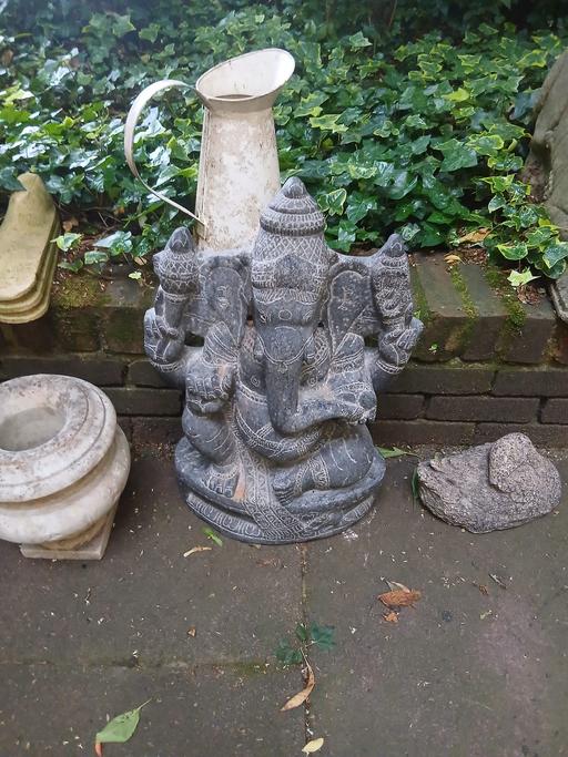  — Icon Garden Statue
