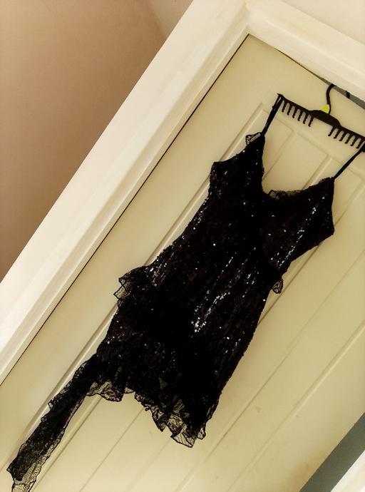  — Dress