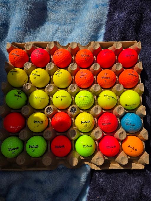  — golf balls