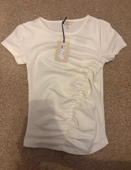  — ruffled river island top