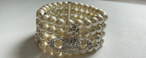  — Vintage elasticated 4 strand pearl bracelet
