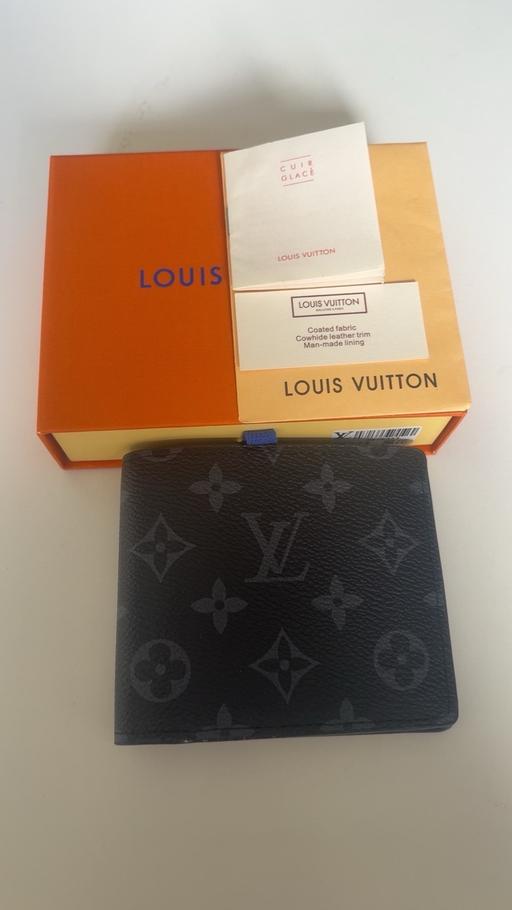  — Designer Wallet