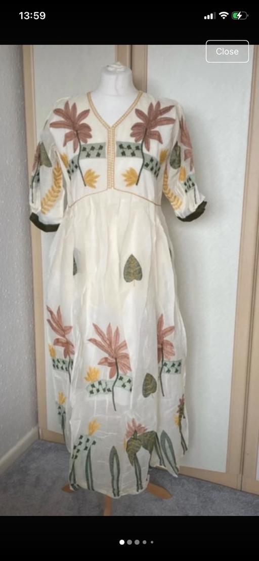  — Dress
